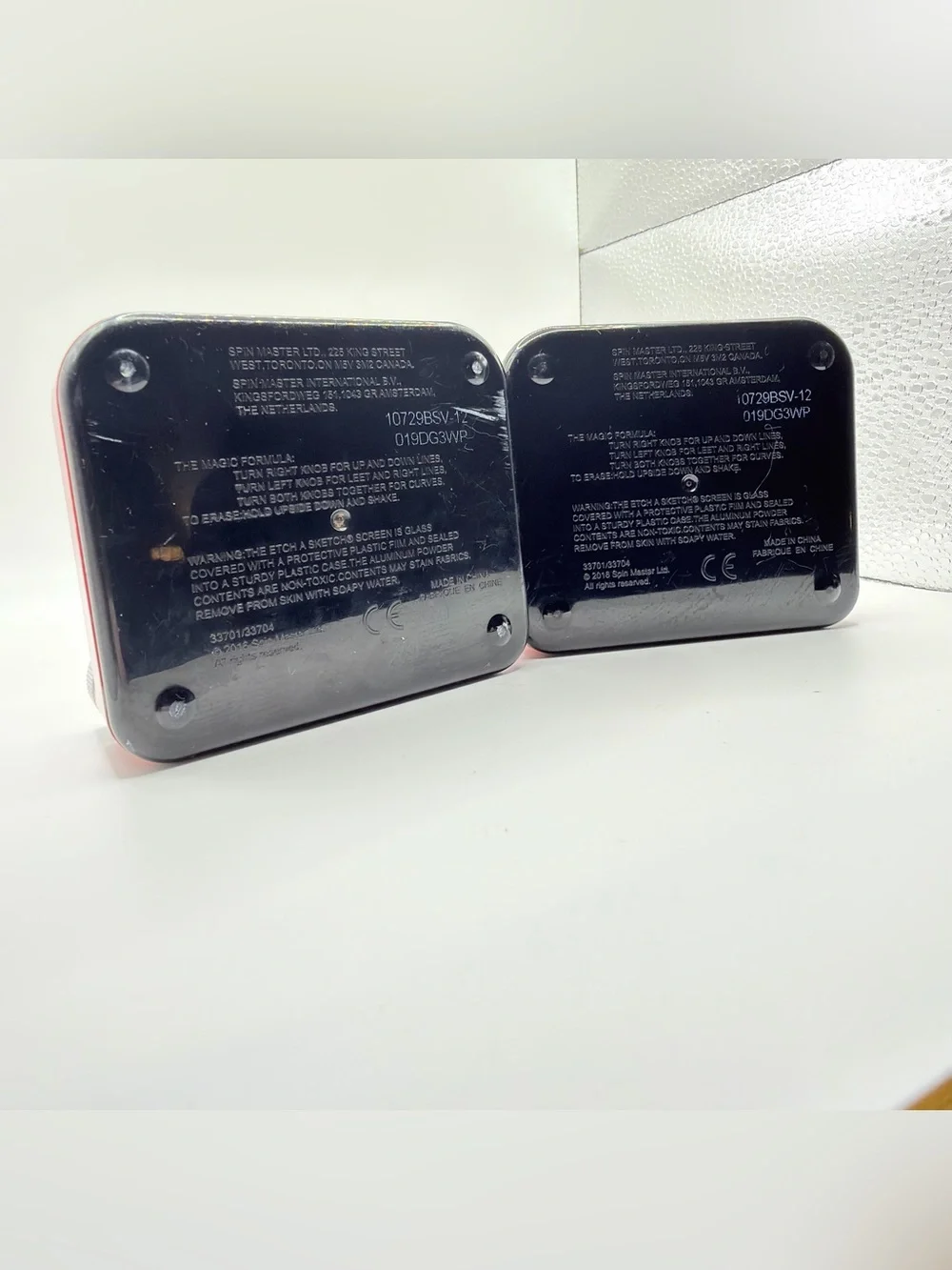 Pair of Mini Classic Red etch a Sketch toys